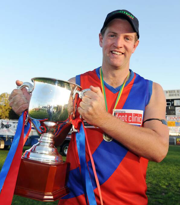 Grant Schultz with the 2010 premiership. Schultz was best on ground in the grand final.