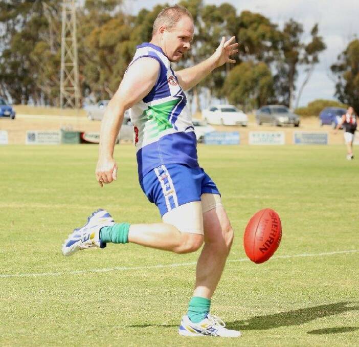 LACES OUT: Chris Tuckwell kicks the ball in a match for Kaniva-Leeor United. Tuckwell is set to play his 300th game for the club this Saturday. Picture: STEVE BROWN