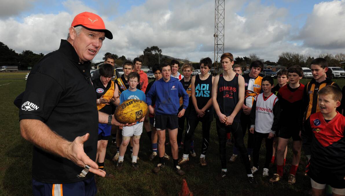 PASSION: Danny Frawley takes a coaching clinic at Bungaree Football Oval in 2012. Picture: Lachlan Bence