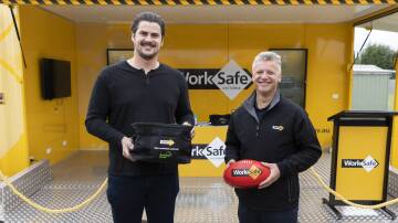 Tom Boyd and Michael Vanderzalm, Senior Inspector at Traralgon, with WorkSafe's safe-tea break pack that encourages farmers to take a well-earned break. 