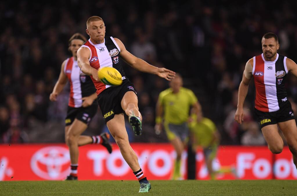 LEADER: Seb Ross kicks the ball during round nine of the AFL against Collingwood at Etihad Stadium on May 19. Picture: AAP IMAGE