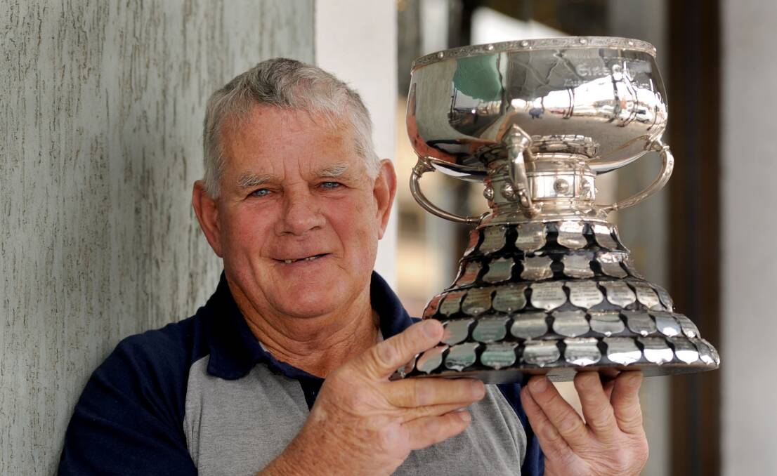Ken Bald with the Eire Cup. He won four in his state representative career with Victoria. Picture: SAMANTHA CAMARRI