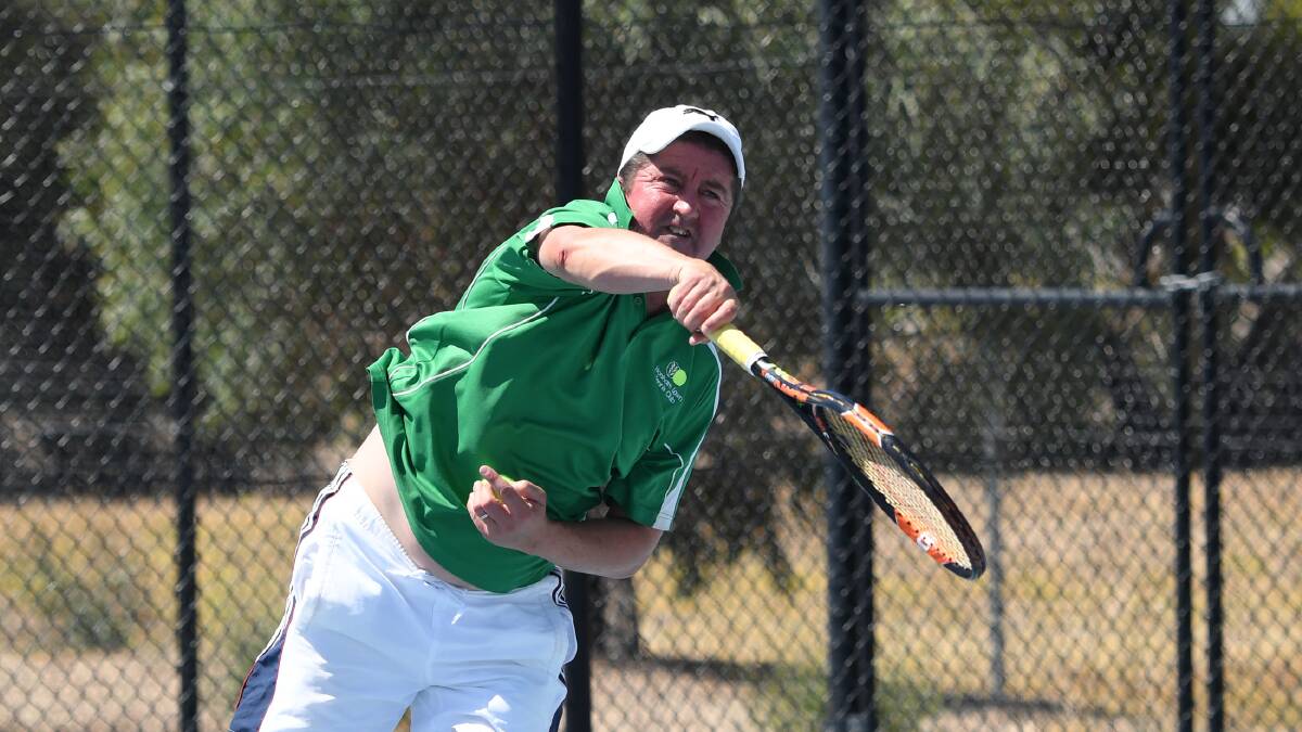 SERVE: Shane Gillespie from Horsham Lawn serves against St Michael's in pennant earlier this month. Picture: SAMANTHA CAMARRI