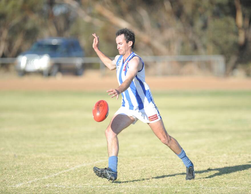 KICK OUT: Harrow-Balmoral's Scott Heath takes a kick out for the Southern Roos in the side's recent loss to Jeparit-Rainbow. Picture: SEAN WALES