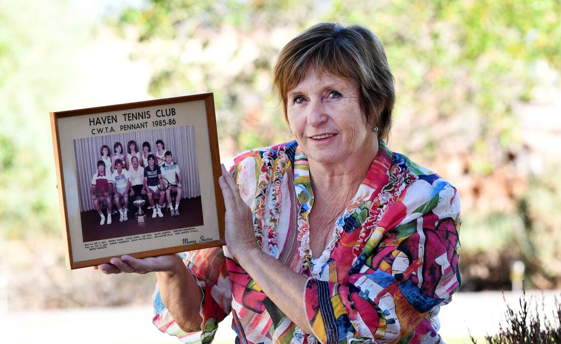 Sue Exell with the team shot from Haven's pennant title in the 1985-86 season. Picture: SAMANTHA CAMARRI