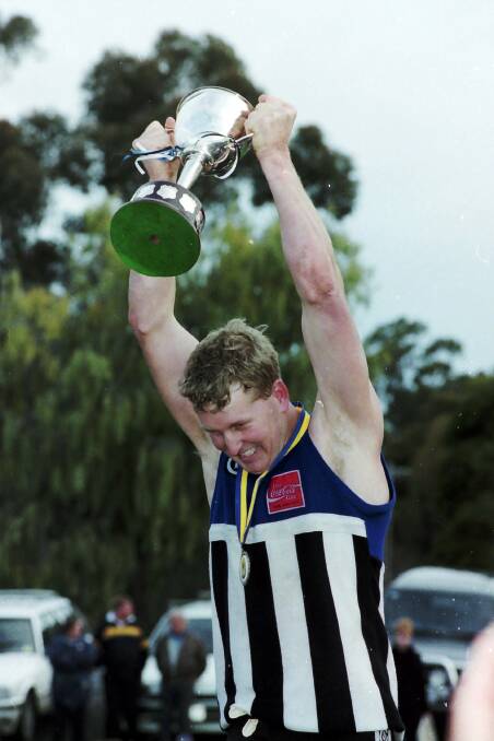 Paul Baker with the premiership cup.