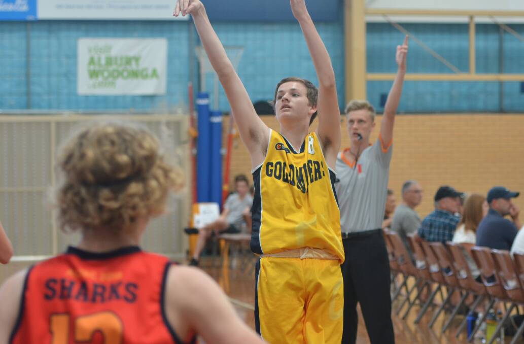 SELECTED: Horsham's Austin McKenzie playing in January's Australian Country Junior Basketball Cup. He has been selected again for Victoria Country. Pictures: ACJBC