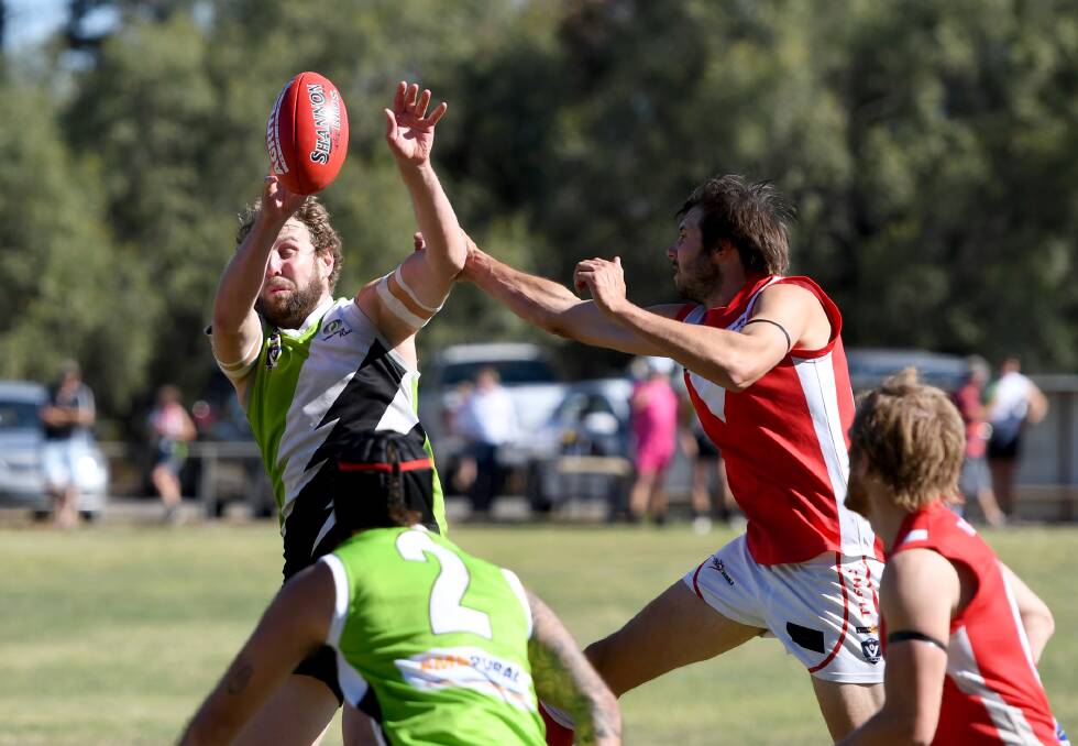 TEST: Taylors Lake's James Dixon tries to spoil Jeparit-Rainbow's Sam Cranna. The Lakers will face another tough test this week against Kalkee. Picture: SAMANTHA CAMARRI