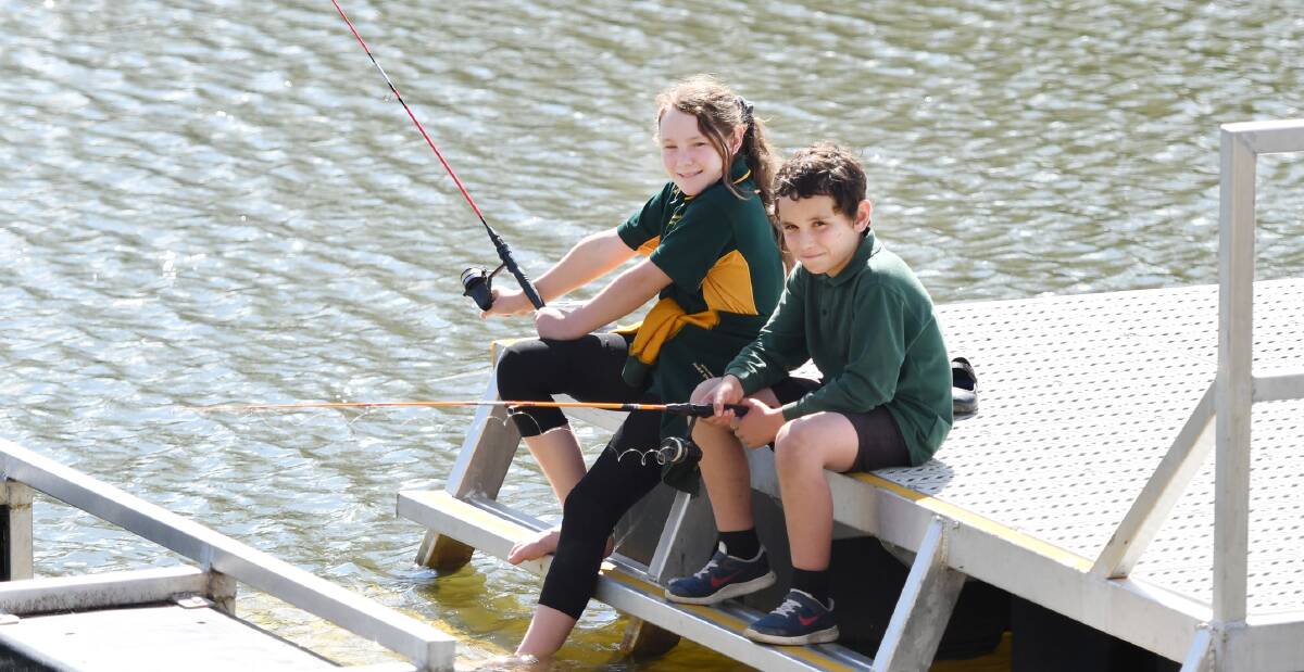 EXCITED: Dimboola's Jamie Clark, 11, and Kye Johnston, 10, get ready for the annual Dimboola Classic Fishing competition. Picture: SAMANTHA CAMARRI