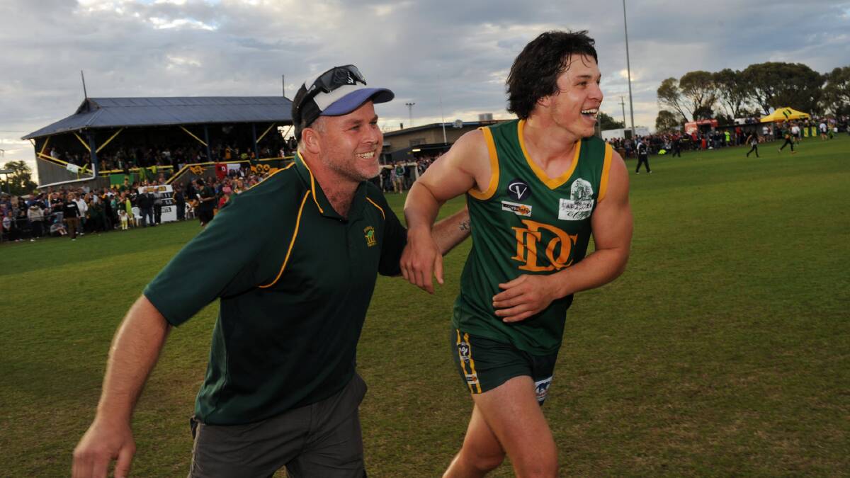 Stuart Farr and Lachie Exell celebrate. Wimmera Football League grand final at Davis Park, Nhill, in 2013.