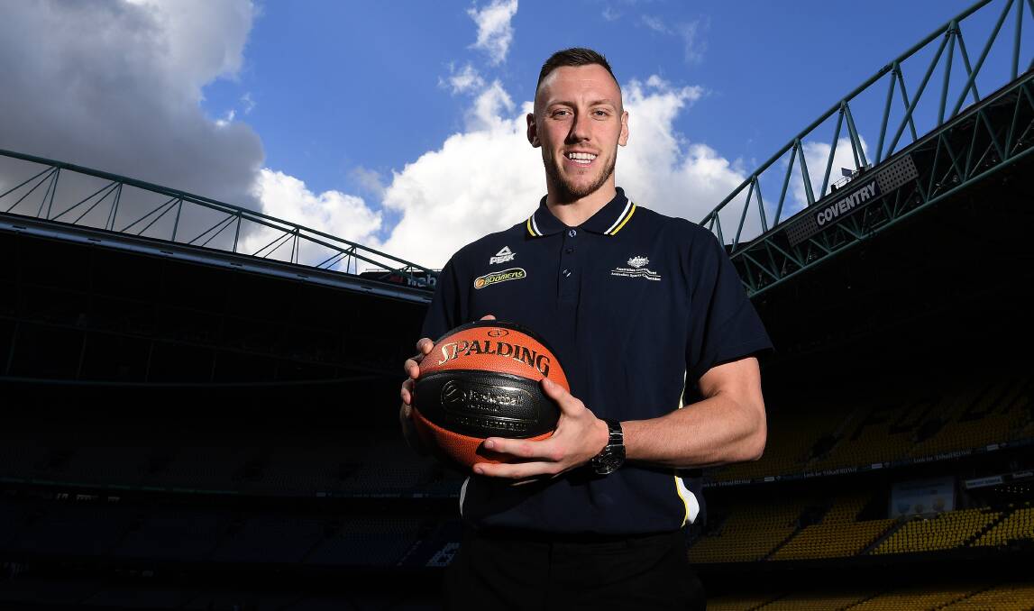 WHAT'S NEXT?: Australian basketballer Mitch Creek poses for a photograph at Etihad Stadium in Melbourne in August before heading to America. Picture: AAP IMAGE/JULIAN SMITH