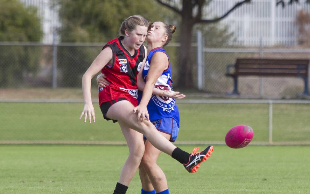 CRUNCH: Stawell's Nadia Martin kicks the ball in a match earlier this season. The Warriors were limited to just three points at the weekend.