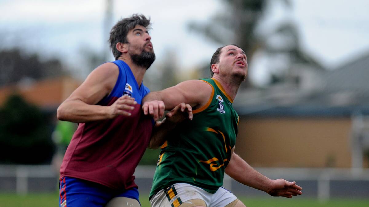 Tim Wade playing in the ruck for the Demons against Dimboola in 2017.