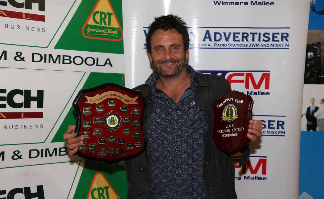 Natimuk United president Adam Blake receives the Champion Club award on behalf of his club. Picture: PETER PICKERING