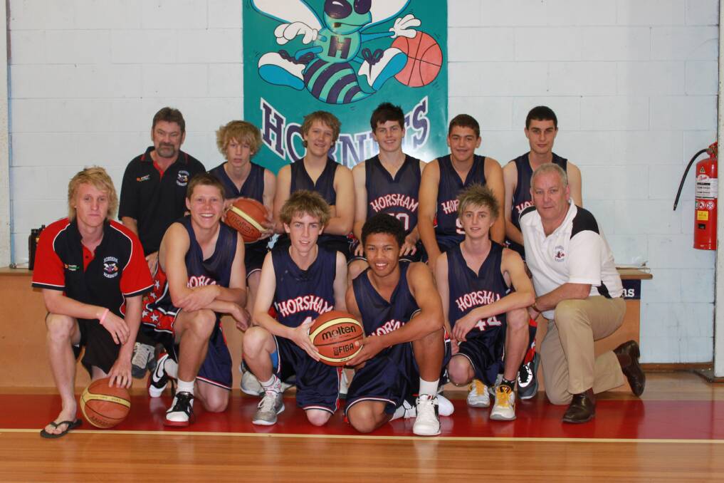 LEADER: Holmes, back left, with the Horsham Hornets CBL team in 2011. Picture: CONTRIBUTED