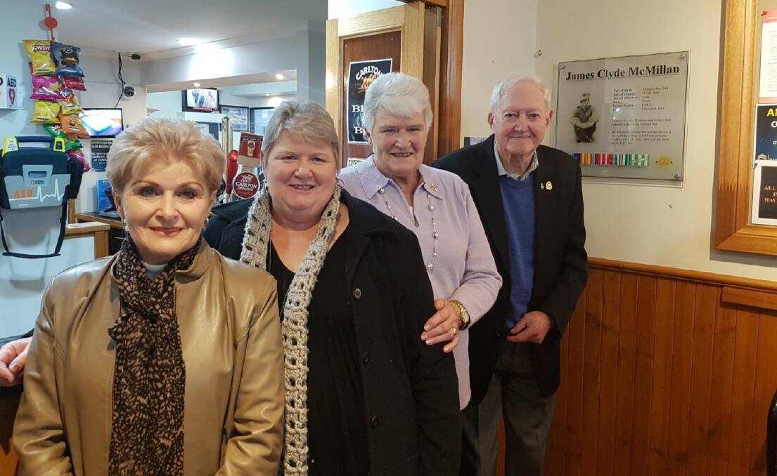 REMEMBERED: Private McMillan's sisters Joy, Dianne and Venie with Horsham RSL committee member Jim Amos by the RSL's new plaque. Picture: CONTRIBUTED