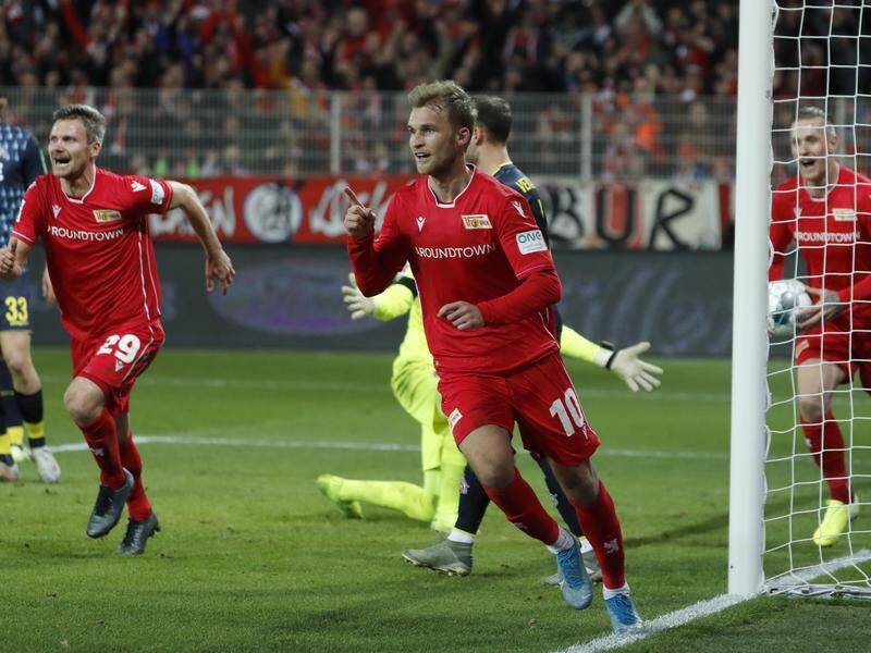 Sebastian Andersson (c) celebrates his opener in Union Berlin's Bundesliga win over FC Kol