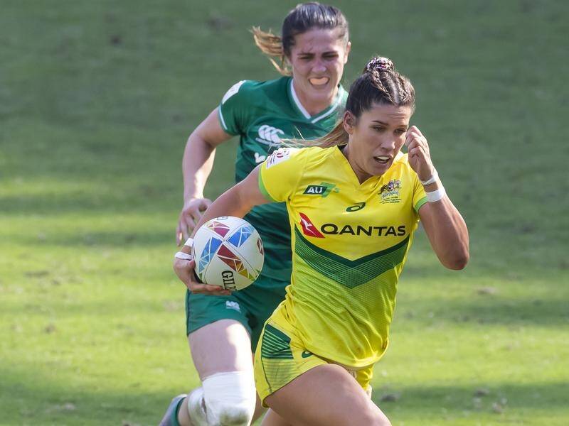 Australia Rugby Sevens star Charlotte Caslick has crossed codes to sign for Sydney Roosters.