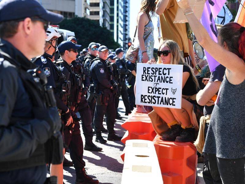 Queensland climate protesters have denied claims of booby-trapping traffic-stopping devices.