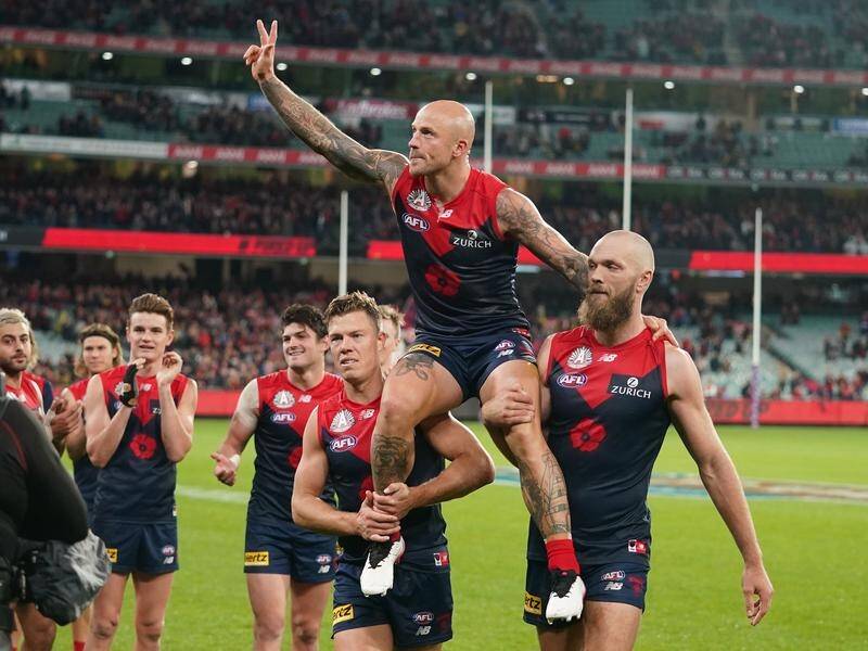 Melbourne stalwart Nathan Jones has retired ahead of the Demons' AFL grand final appearance.