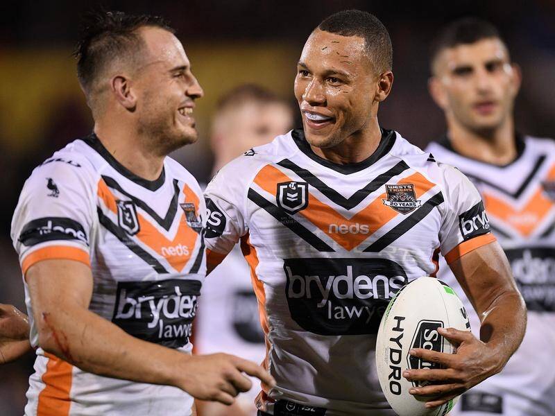 West Tigers star Moses Mbye (R) will be available for the Maroons for Origin I, his coach says.
