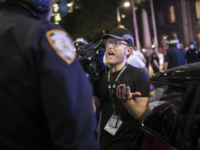 AP video journalist Robert Bumsted who was shoved and sworn at by New York police officers.