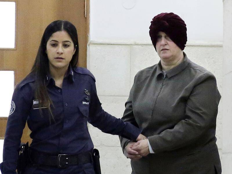 Malka Leifer is brought to a courtroom in Jerusalem where she is fighting extradition to Australia.