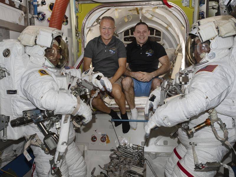 SpaceX and NASA plan to bring astronauts Bob Behnken and Chris Cassidy, suited up, back on Sunday.