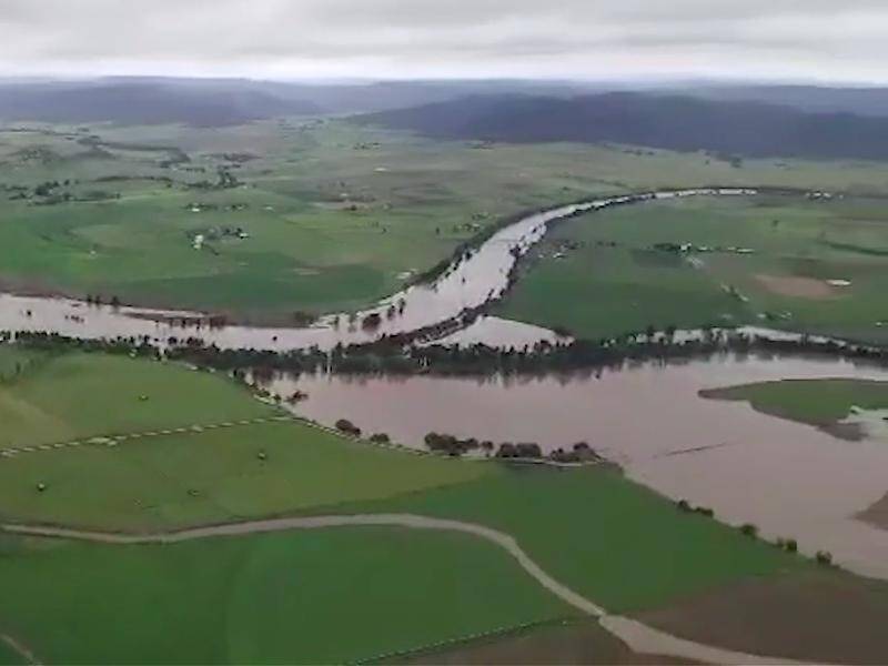 Rain is set to continue on the first day of summer after weeks of flooding around NSW.