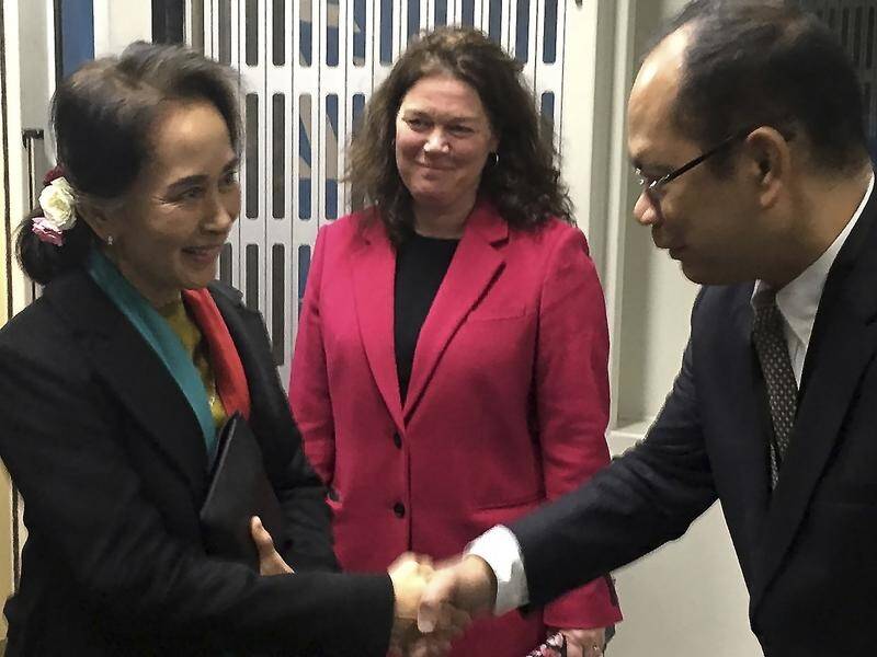 Aung San Suu Kyi has arrived in the Netherlands to defend Myanmar against genocide charges.