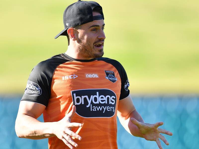 Wests Tigers' Josh Reynolds can't see much wrong with Brisbane stars playing the pokies.