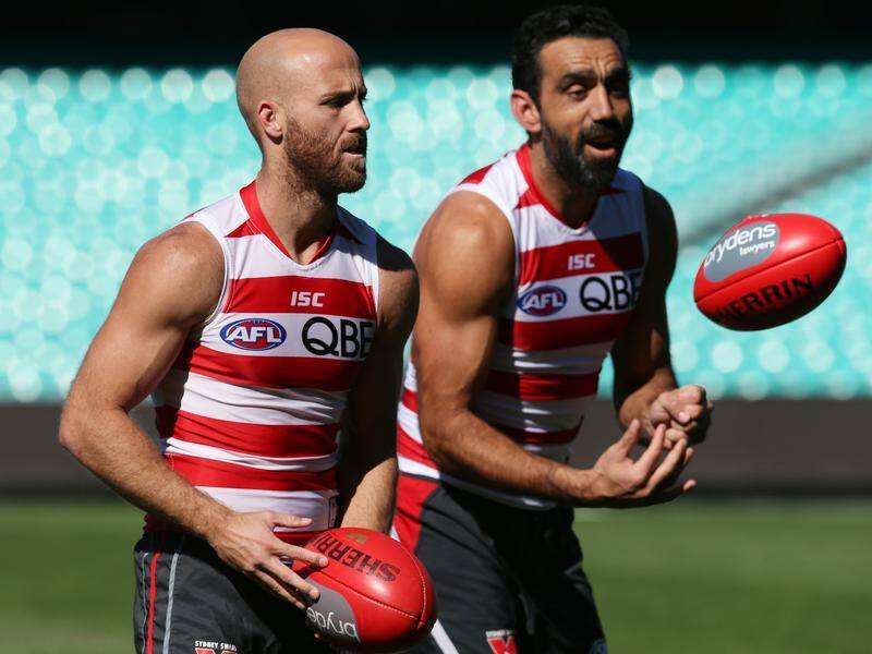 Jarrad McVeigh (left) expressed regret after watching a confronting documentary on Adam Goodes.