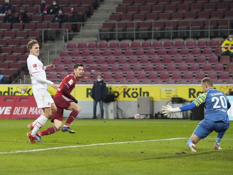 Bayern's Robert Lewandowski completing his hat-trick in the 4-0 thumping of Cologne.