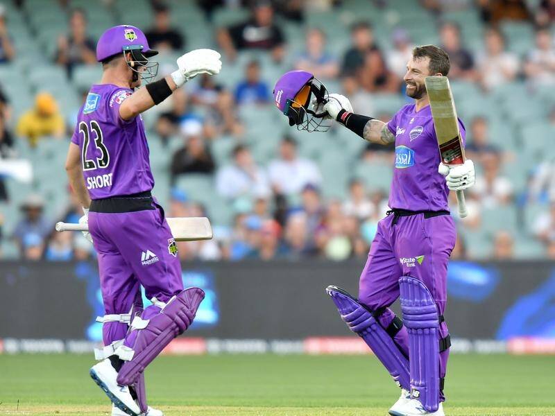 Matthew Wade (R) has blasted 130no off 61 balls in Adelaide to march Hobart into the BBL finals.