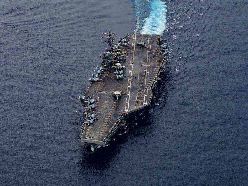 USS Ronald Reagan is leading an aircraft carrier group in the South China Sea, the US Navy says.