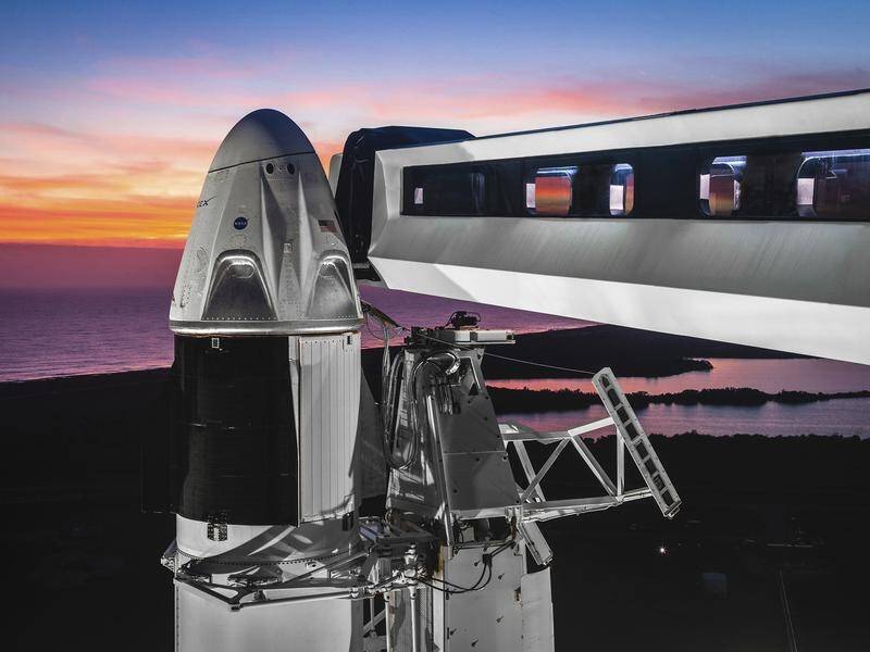 NASA and SpaceX have approved a test flight of the Dragon capsule.