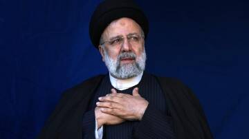 A helicopter carrying Iranian President Ebrahim Raisi has had to make an emergency landing. (AP PHOTO)