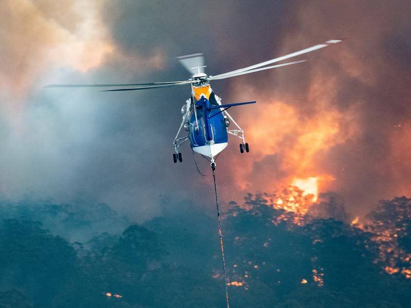 Thousands have evacuated bushfire areas in Victoria's East Gippsland and southern NSW.