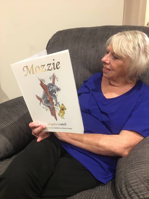 STORYTIME: Author Angela Castell with her new children's book, Mozzie. Picture: CONTRIBUTED