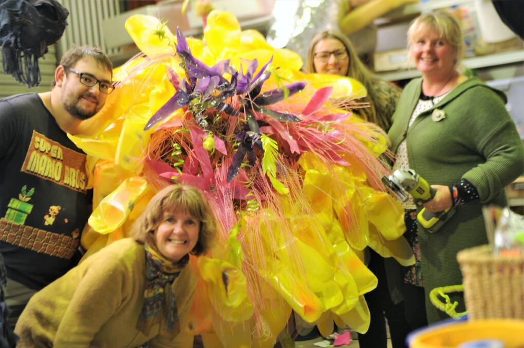 FESTIVAL BLOOMS: Artist Matthew McLoughlin, Art Is... Festival special project co-ordinator Elaine Uebergang, festival general manager Sarah Natali and artist Nichola Clarke with Mrs Clarke's artwork for the festival. Picture: SONIA SINGHA