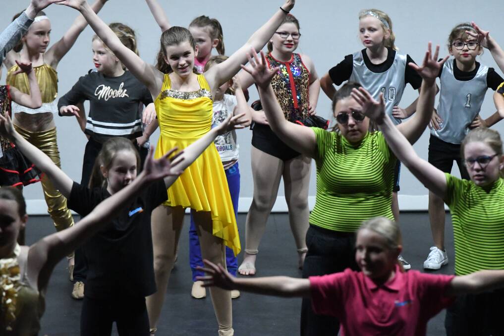 PERFORMANCE: Students rehearse at the Horsham Town Hall before the big day. Picture: SONIA SINGHA