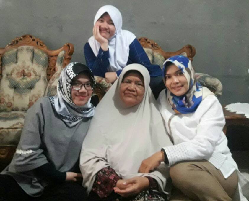 Ms Dewi with her mum Nining, grandmother Titin and sister Nanda at Eid-ul-Adha last year in Indonesia. Picture: CONTRIBUTED