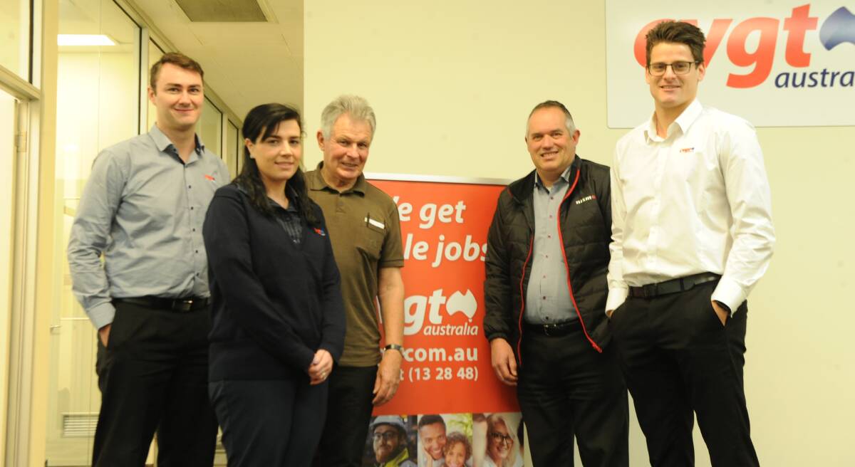 CHARITY: CVGTs Corey Dixon and Jess Dickerson, Healthy Minds Horsham members Rob Walter and Gavin Morrow and CVGT manager Justin Beugellar. Picture: SONIA SINGHA