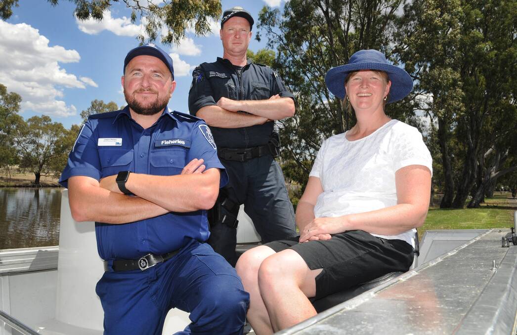 ON THE WATER: Jason Peters, Fisheries Victoria, Glenn Mackenzie, Water Police Squad, and Rhonda McNeil, Horsham Rural City Council. Picture: AYESHA SEDGMAN