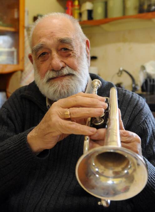 BOWING OUT: Dimboola man Harry John, with his cornet, is retiring as Horsham Brass Band master, a position he has had for 25 years. Picture: SAMANTHA CAMARRI