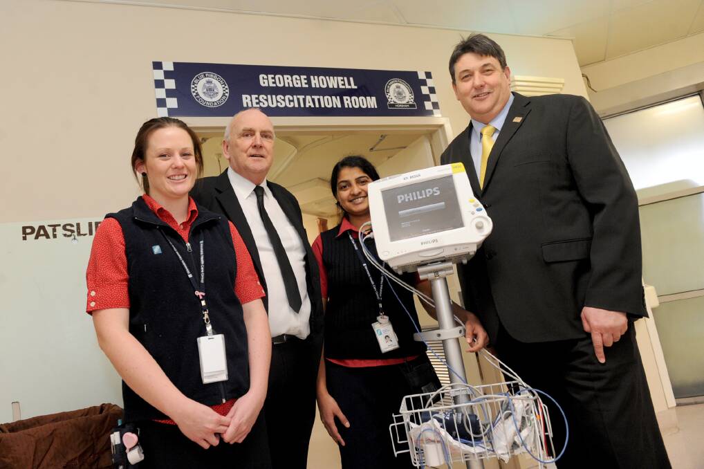 GLAMOUR MONITORS: Wimmera Base Hospital nurse Amy Beddison, Horsham Blue Ribbon Foundation branch president Peter Daffy, hospital nurse Remya Lonappan and foundation branch member Geoff Lord hope a glamour ball and charity auction will raise enough money to buy another patient monitor and trolley for Horsham's Wimmera Base Hospital. Picture: SAMANTHA CAMARRI