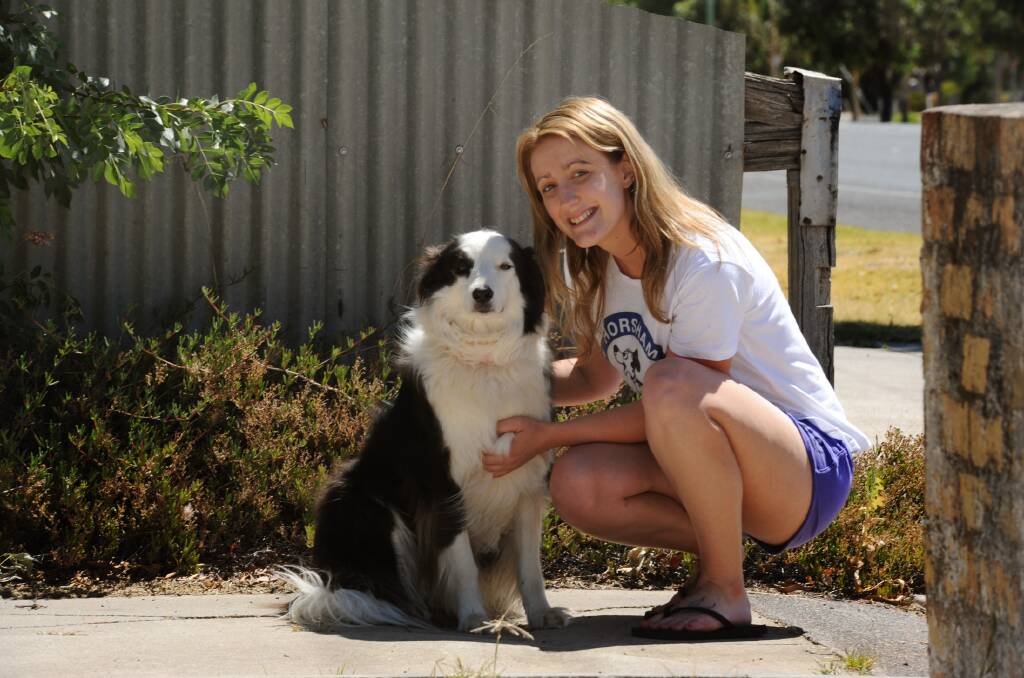 SHORTLISTED: Horsham PAWS vice-president and Horsham Dog Obedience Club secretary Tarni Eldridge with her pet dog Cassie. Mrs Eldridge has been nominated to be on the cover of the White Pages. Picture: PAUL CARRACHER