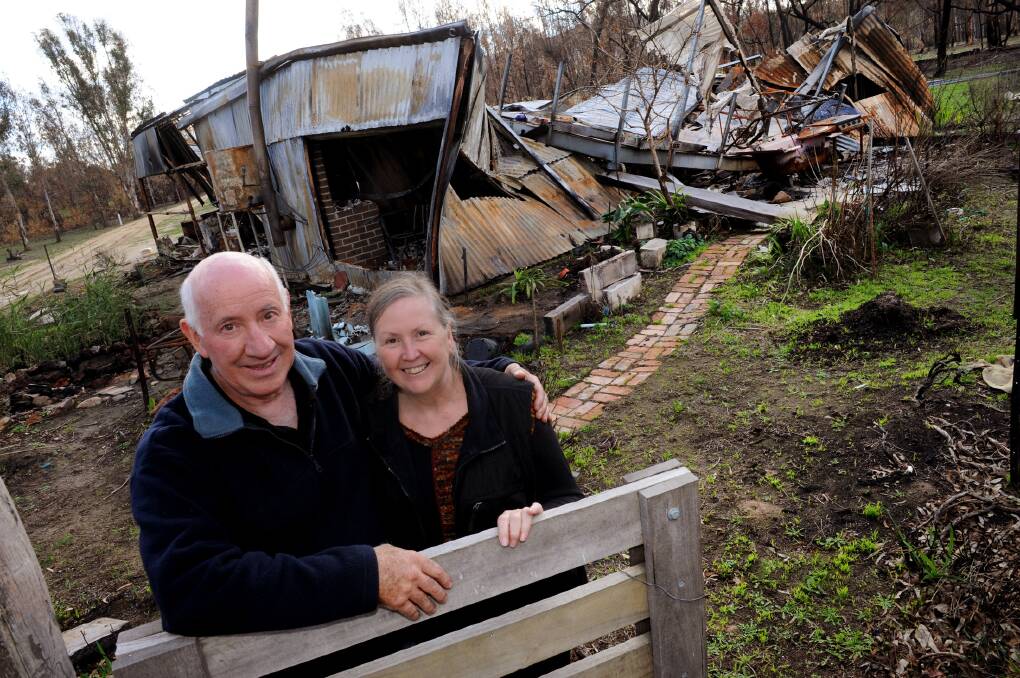 RISING FROM THE RUINS: Wartook couple Garry and Julie Newman are getting their lives back on track after the Grampians fire. Picture: PAUL CARRACHER