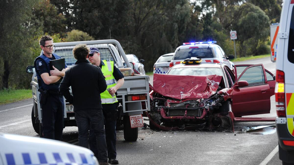 CRASH: Emergency services attend a two-car crash at Horsham, near the intersection of the Wimmera Highway and Perry Drive. Picture: PAUL CARRACHER
