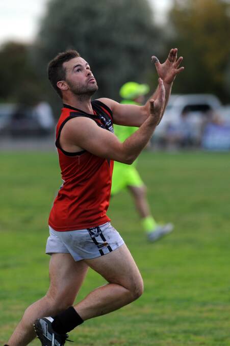 EYES ON THE BALL: Stawell's Matt Considine looks to mark in a match against Warrack Eagles earlier this year. Picture: PAUL CARRACHER